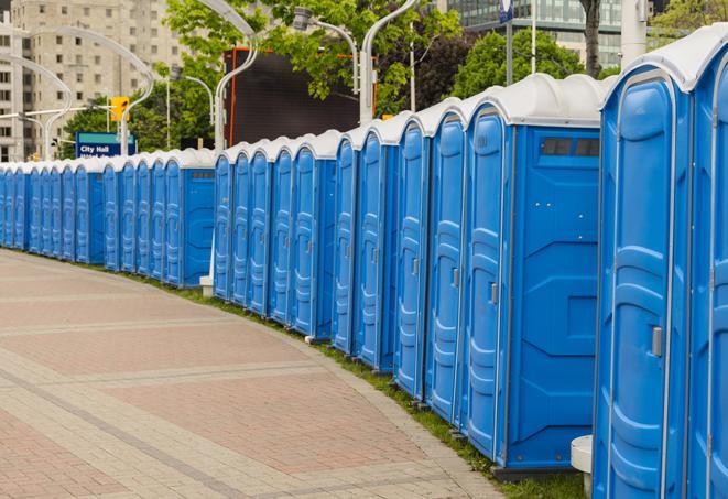 a row of portable restrooms set up for a special event, providing guests with a comfortable and sanitary option in Encino